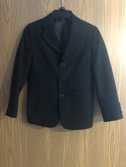 Boys black suit with white shirt and white tie. Size 8.