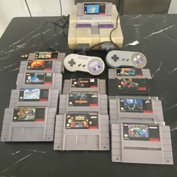 super Nintendo W/t 12 Games & 2 Controller 