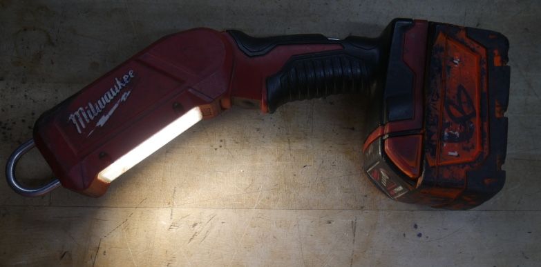 Milwaukee Tool 2352-20 M18 Stick Light Tool  with 3AH BATTERY USED. TESTED. IN A GOOD WORKING ORDER. 