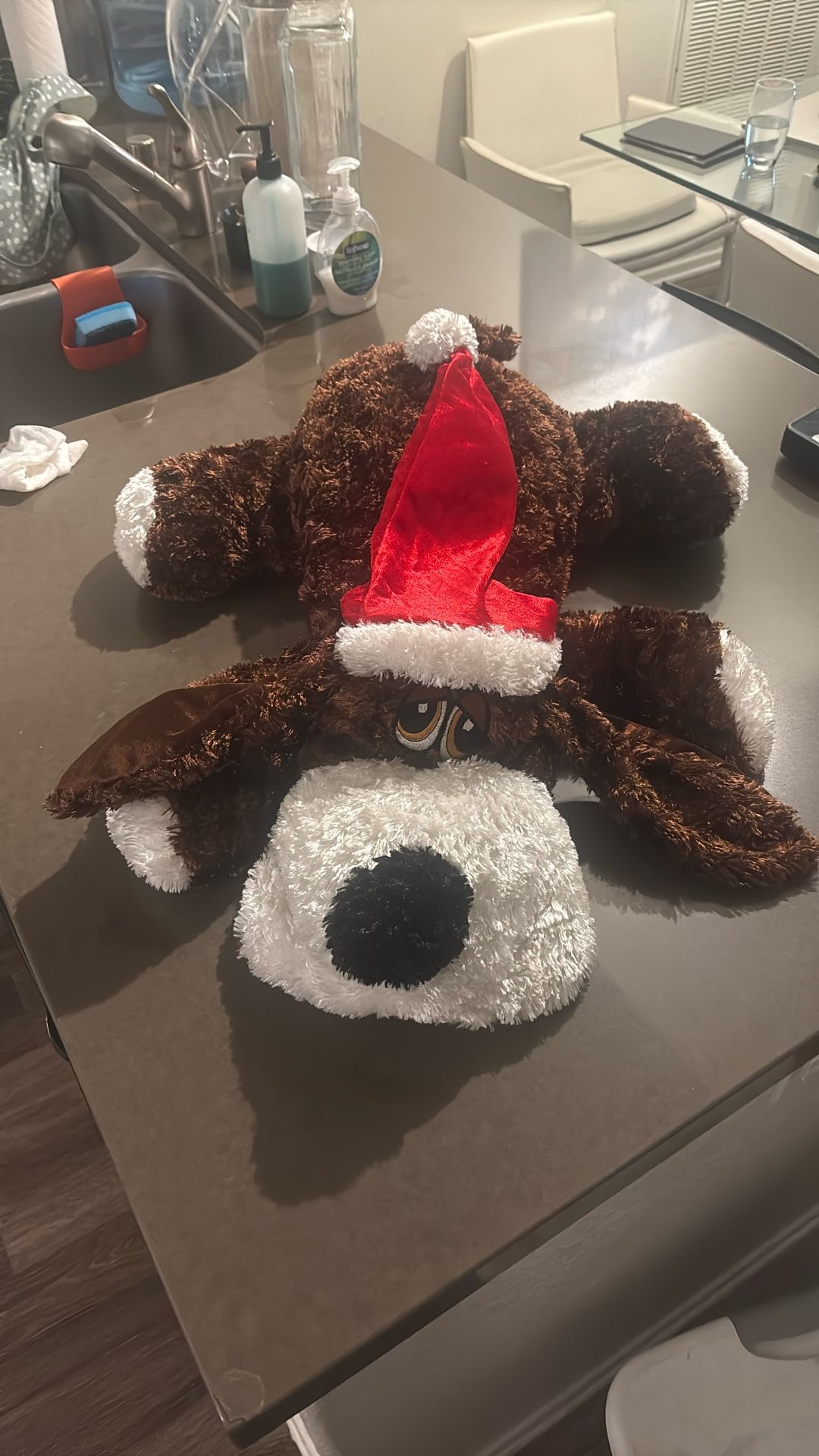 Christmas stuffed animal dog with sleepy eyes