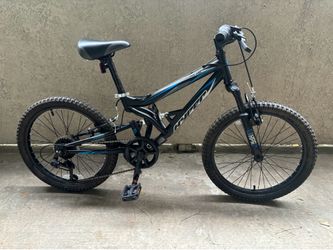 Hyper Shocker 20” kids Bike Black/Blue Front Suspension V- Brakes Grip shifter