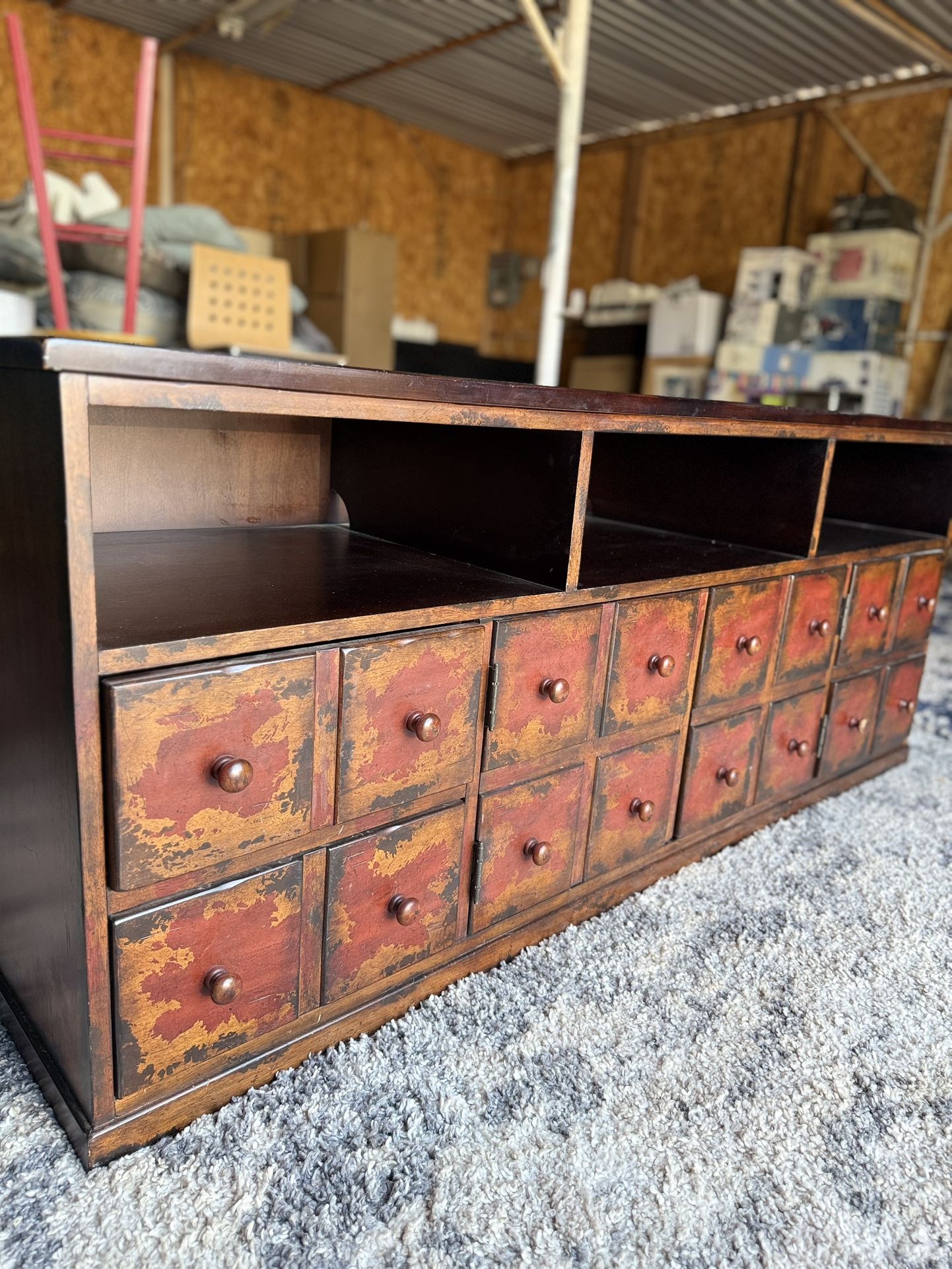 It has some light scratches on the top from use. (L65”w19.5”H26.5”)