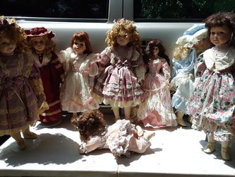 Collectible Memories porcelain dolls some are limited edition asking $200 firm
