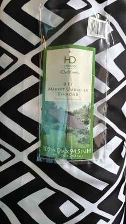 New, two outdoor umbrellas! Colors black and white size 9ft