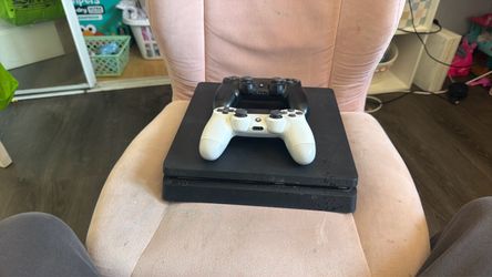 Sony PS4 Slim Console with Two Controllers