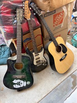 THREE GUITARS IN GOOD SHAPE