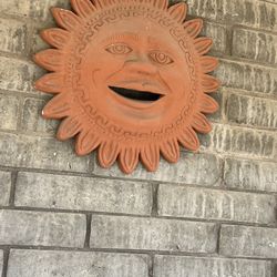 vintage or decorative terracotta sun face wall plaque, often found in Mexican or Mediterranean-style garden decor.  Very Good Cond.