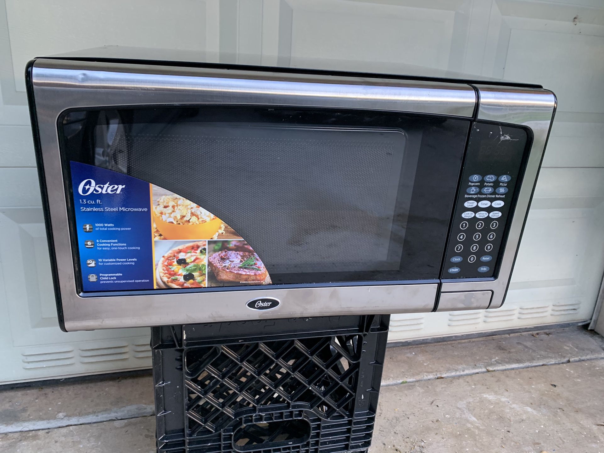 BRAND NEW Microwave Oster 1000 W
