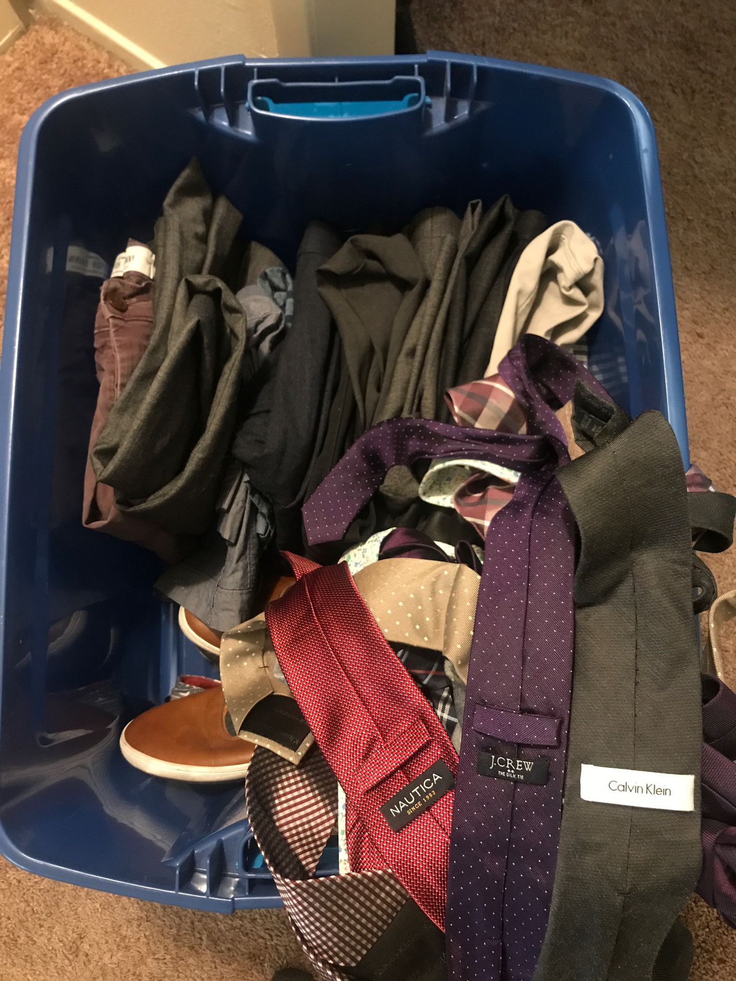 Box of name brand clothes