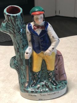 Staffordshire style Character Spill Vase.