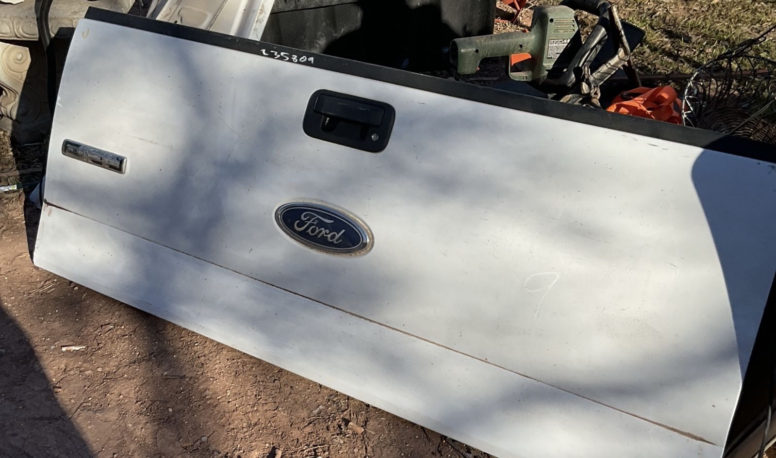A Ford tailgate it’s 26 nches tall and 64 inches wide