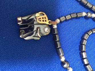 Weddings, Good luck pendant grey and gold