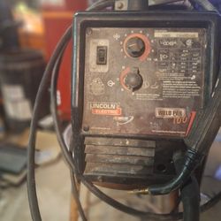 Lincoln Weld Pac-100 mig welder with a welder cart. 