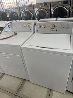 Kenmore top load washer and electric dryer set