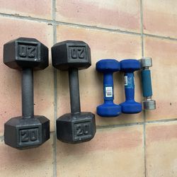 Two Sets of Dumbbells 20 lbs and 5 lbs. Plus one 2.5 lbs. For a total of 52.5 lbs