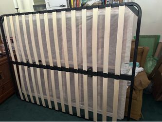 Queen bed support slats. Great condition! Very sturdy foldable metal frame.. like new!