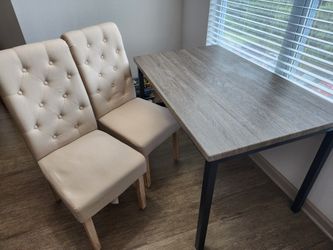Dining Room Table With Tufted Ivory Chairs