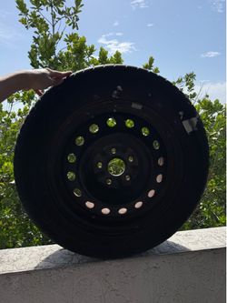 215/60R16 Tire with Steel Rim – Good Condition
