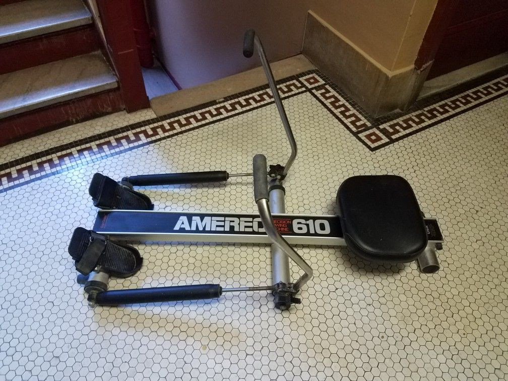 Rowing exercise machine