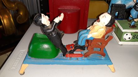 Vintage cast iron mechanical dentist pulling tooth bank