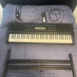 Casio WK-500 electronic keyboard with stand and foot petal