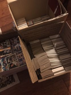Three boxes full of baseball cards