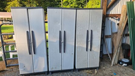 3 gray outdoor storage cabinets