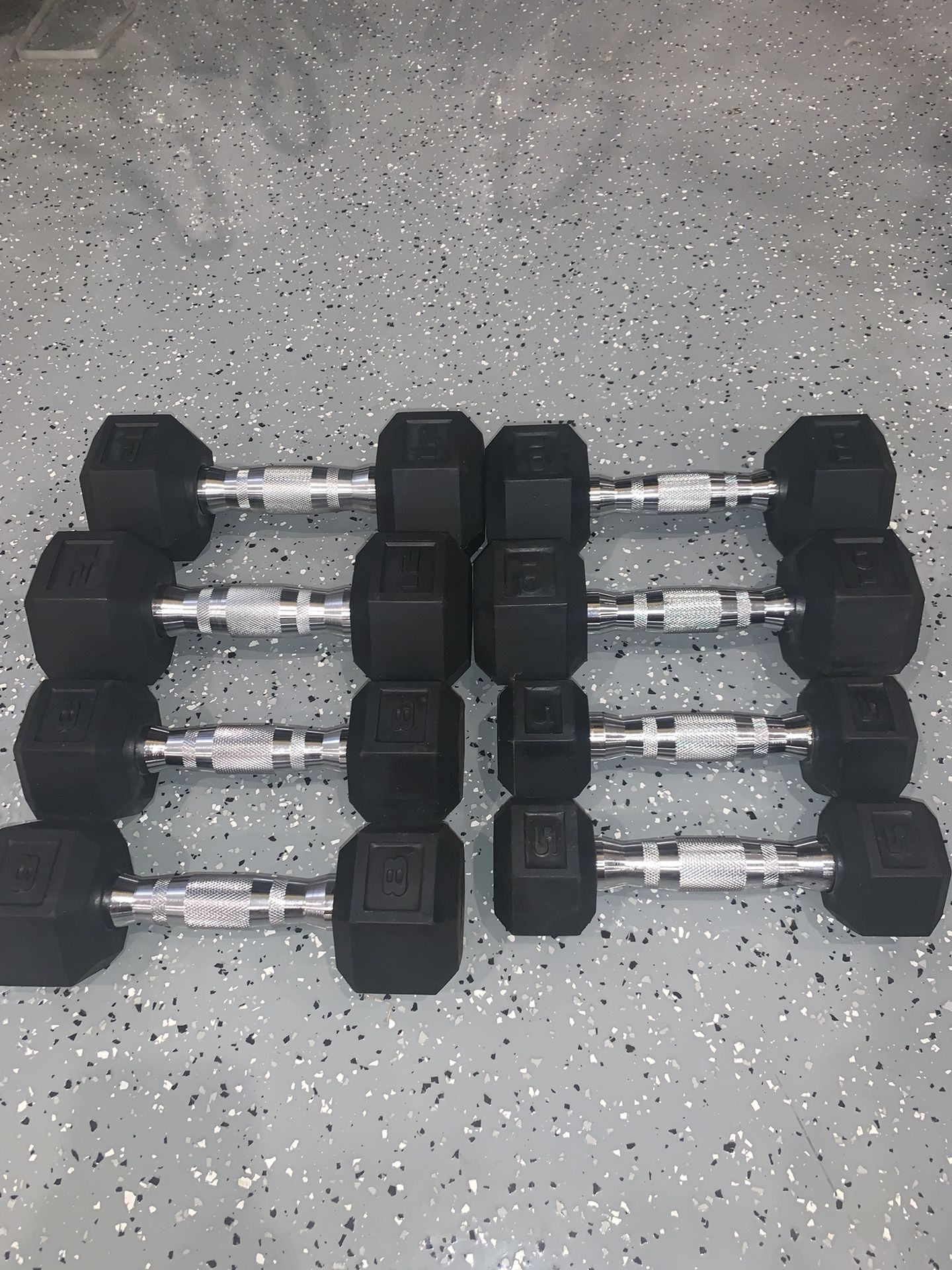 Sets Of 12, 10, 8, And 5 Pound Dumbbells 