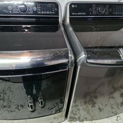 LG 5.7 Cu.Ft. Mega Capacity Top Load Washer With TurboWash And 7.3 cu. ft. Ultra Large Capacity Electric Dryer with EasyLoad Door