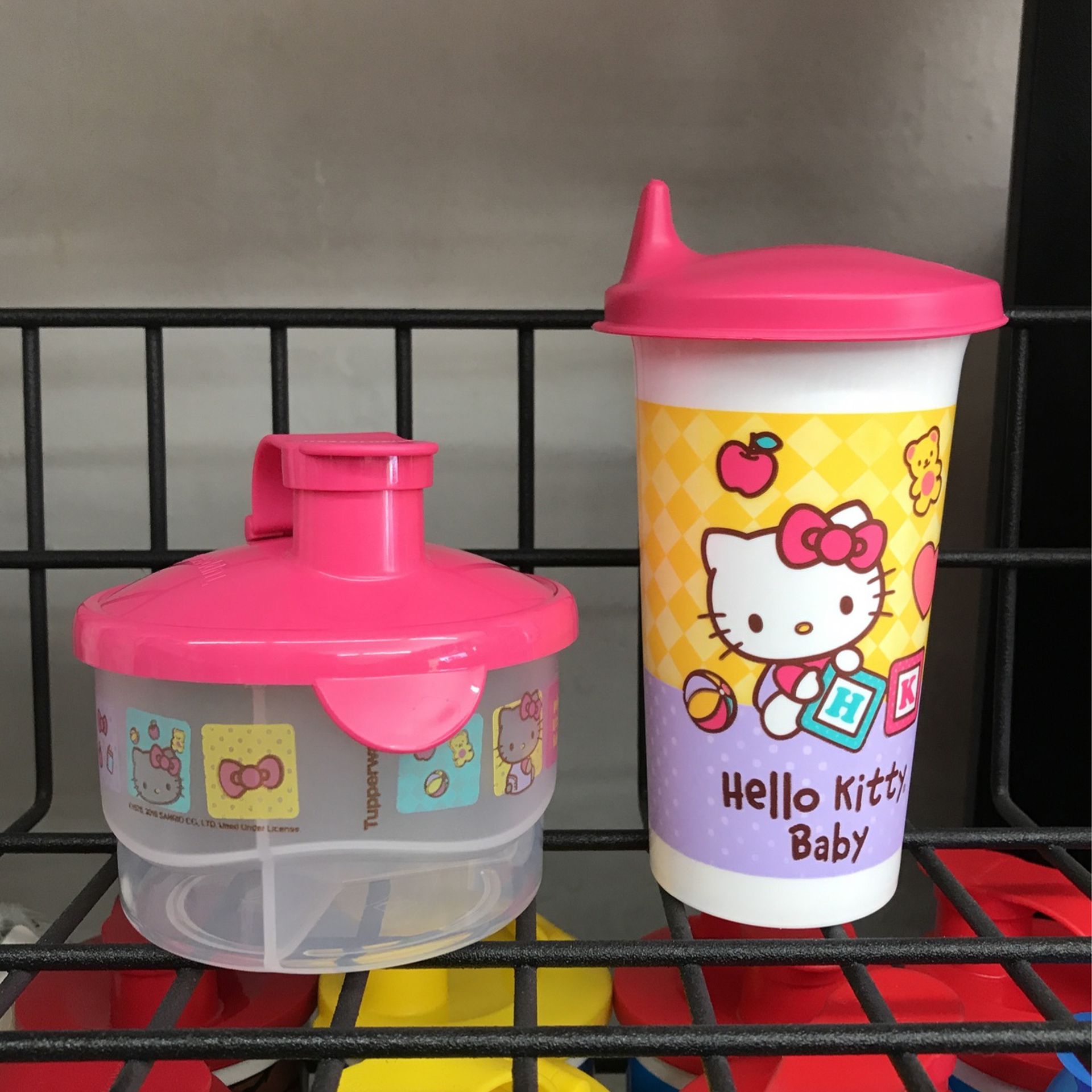 Tupperware Set of Hello Kitty Baby Bottle Feeder with container included