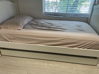 2  Twin Beds with trundle