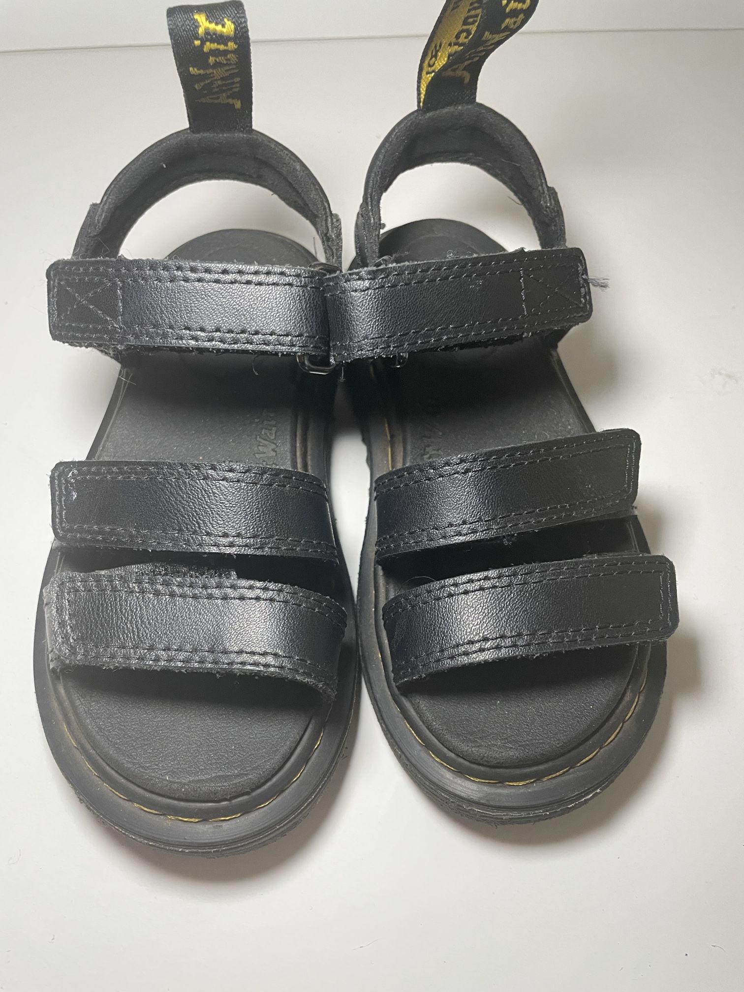 These are Dr. Martens Youth Klaire Leather Strap Sandals