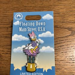 Disney Pin Daisy Duck Floating Down Main Street USA.  Brand new on original card.  Smoke free home 