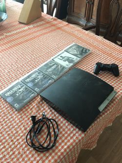 PS3 Slim with Games