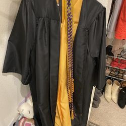 1 Graduation Gown size small with caps