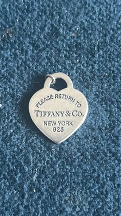 Please return to Tiffany and Company, New York 925 Sterling Silver heart