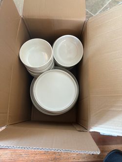 New set of porcelain dishes, unused. Set of 8