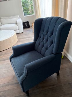 Blue tufted wing black reclining chair