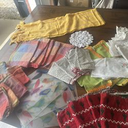 Variety Of Place Mats, Napkins And Table Runner