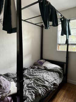 Bed With Curtains And Table