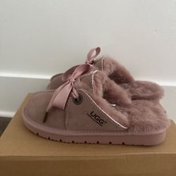 Pink UGG Australian slippers.