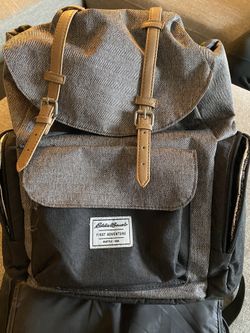 Gray eddie bauer diaper bag with portable changing pad and 2 bottle warming pockets. In excellent condition. No pets no smoking $30