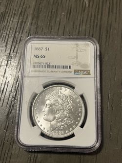 1887 Morgan Silver Dollar $1 – NGC MS65 Certified
