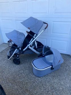 Blue Melange Uppababy V2 Vista Double Stroller with bassinet and car seat