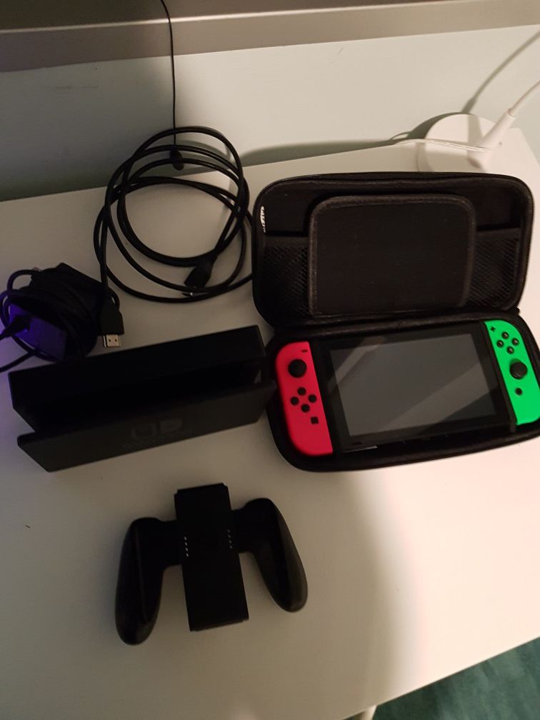 Nintendo switch with 64gb sd card and a case