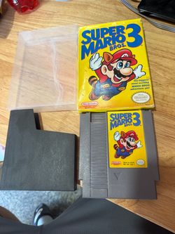 Super Mario Bros. 3 Nintendo NES, 1985 Authentic Tested W/ Original Box Protecto  The product is a complete in box (CIB) Super Mario Bros. 3 for the N