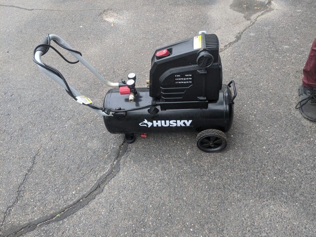 Husky compressor months off used comes with box