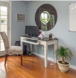 Sturdy desk with pull out drawer for keyboard.