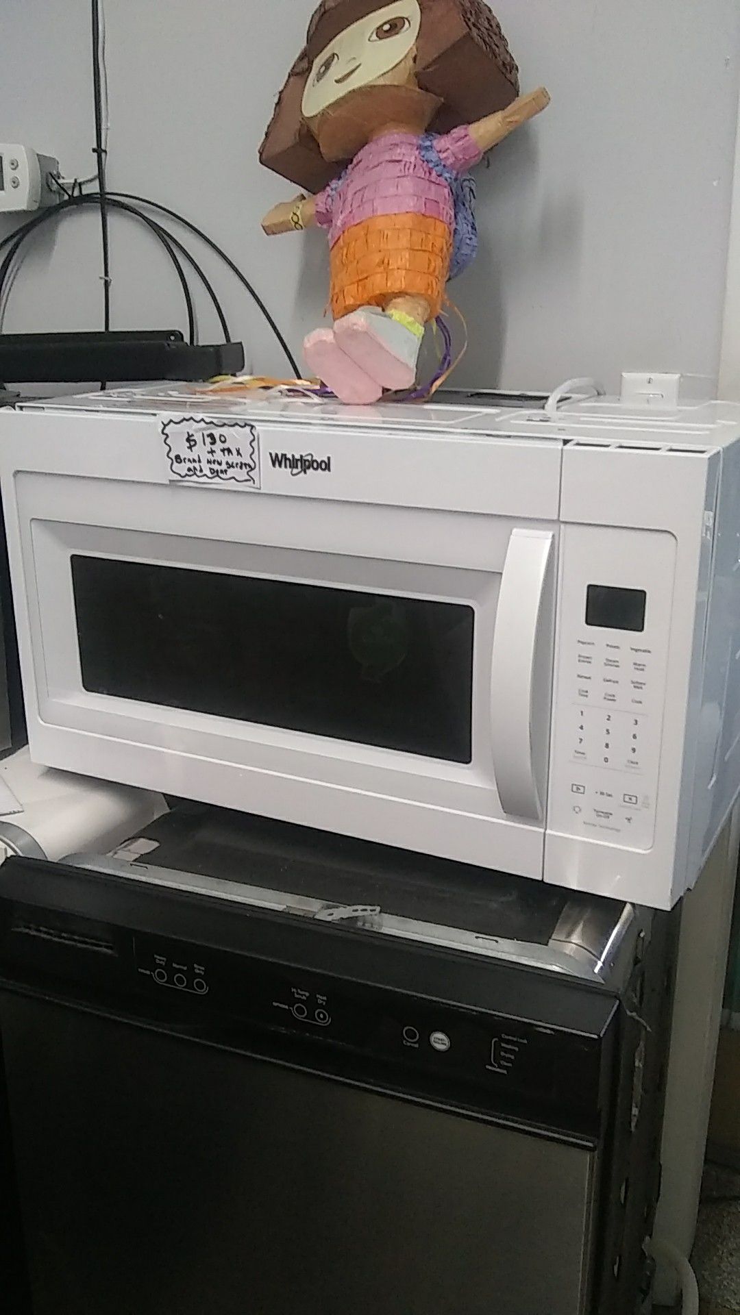 Whirlpool microwave oven brand new scratches and dents