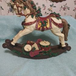 Musical X-Mass Rocking Horse. 12 Inc High, 14 1/2 Inc Wide.